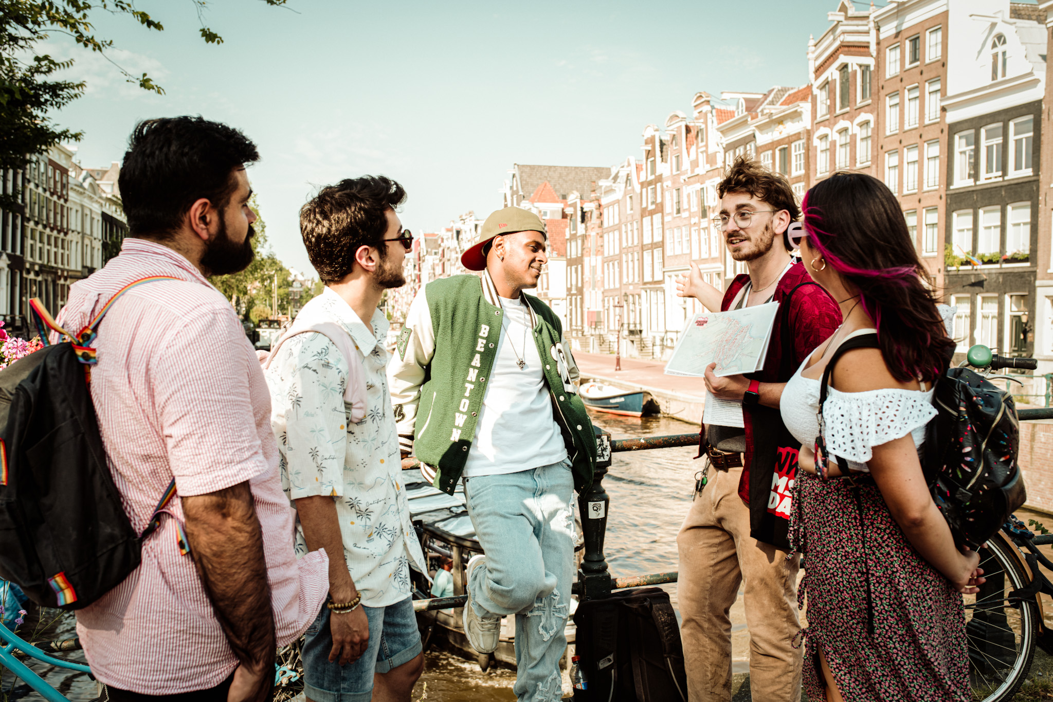 Hello Amsterdam Walking Tour Guide Explaining at canal